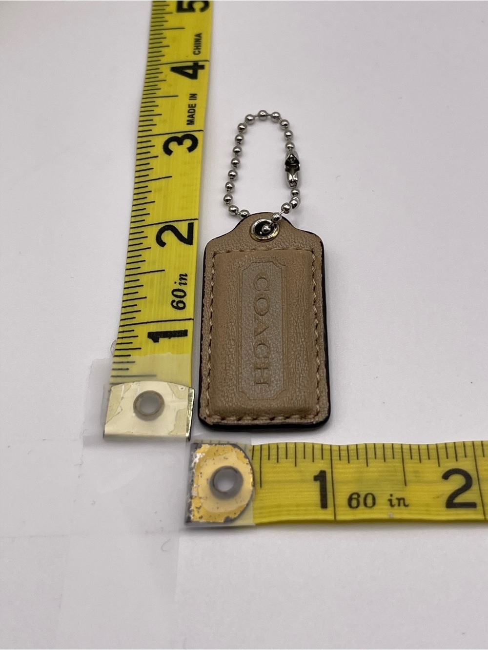 COACH Leather Hang Tag Keychain in Taupe - Picture 2 of 3